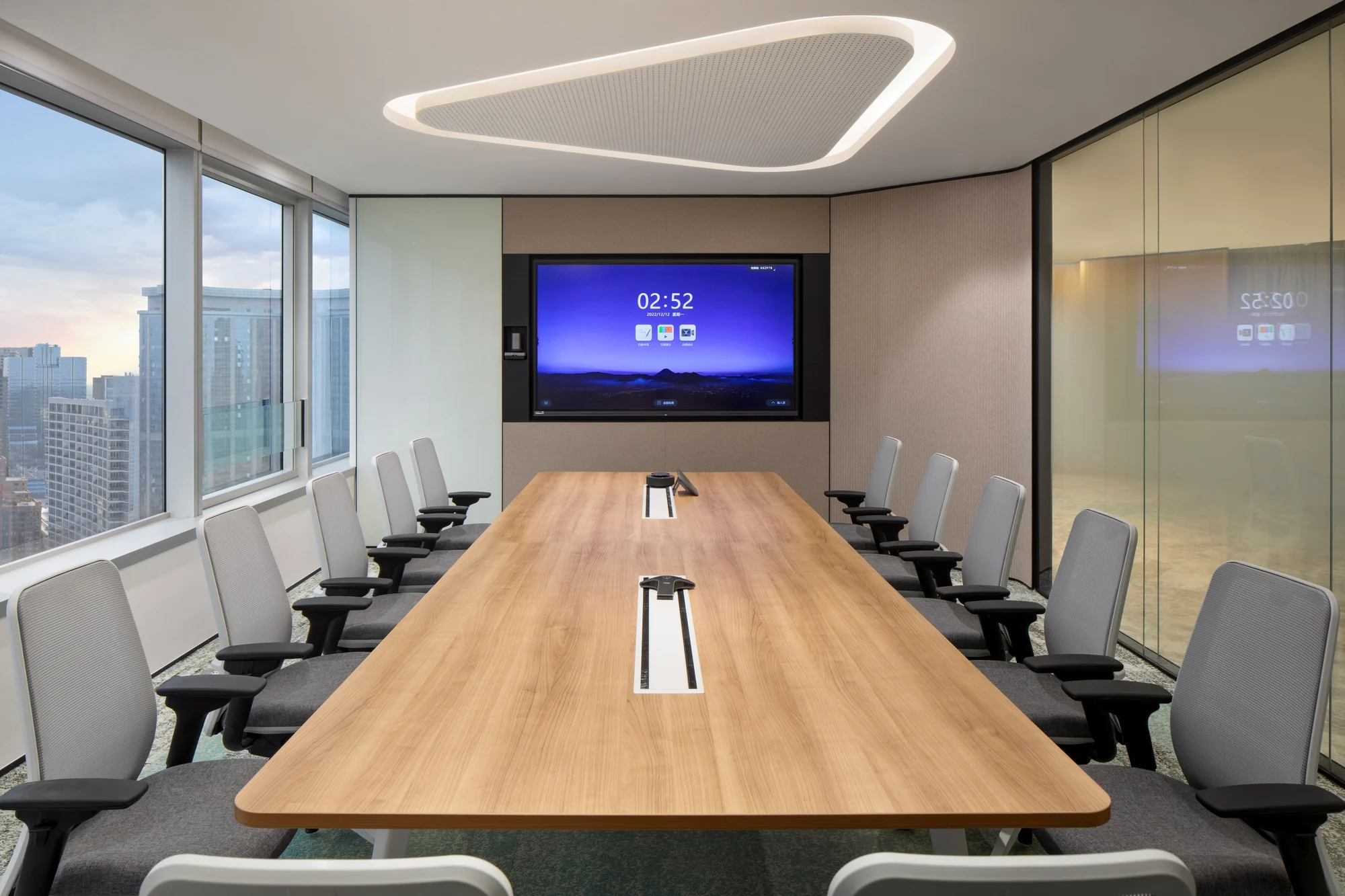 Large executive boardroom with sculptural ceiling light