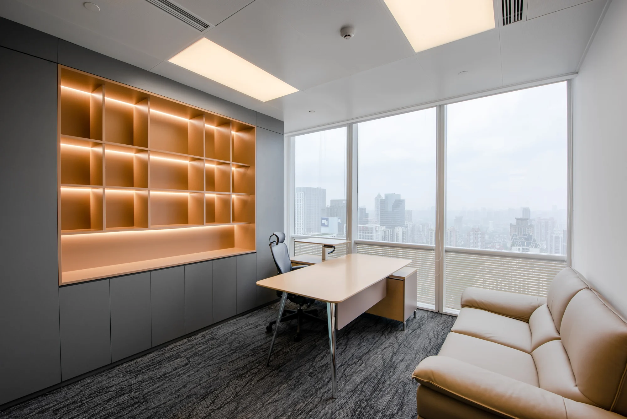 Quiet executive office with illuminated shelving